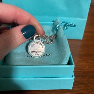 Tiffany sterling medal “please return to Tiffany NYC” with chain